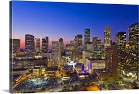 Wandering around downtown is an activity in itself, just marveling at the architecture and incredible buildings on display. Dowtown City Skyline At Dusk Sunset Night Houston Texas Usa Wall Art Canvas Prints Framed Prints Wall Peels Great Big Canvas