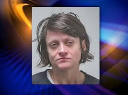 Naked woman arrested for public indecency, active warrant