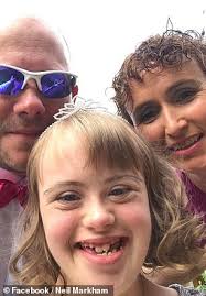 Proud football fan defends his Down's Syndrome daughter