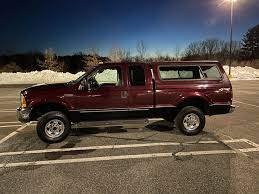 Image result for Dark Toreador Red 2000 F250