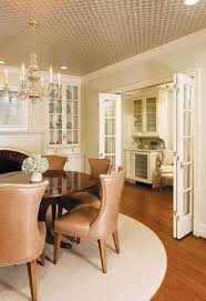 This room has a french door and windows which make the outdoors more visible, thus, giving a fresh feeling to the room. Home Design Magazine Home Design Interior Design French Doors Interior Bifold French Doors Dining Room French