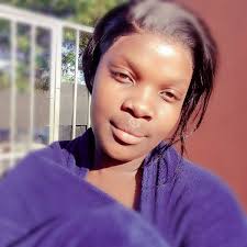 Male bird with grey bar and light beak