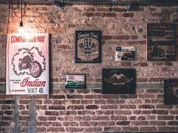 Maintain a warm color palette by decorating your room with wood pieces to further complement the brick. Home Decor Pictures Exposed Brick Wall Ideas To Get Inspired From The Times Of India