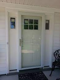 Fiberglass front entry door with sidelights 61 1/4 x 81 x 5 1/4. Doormasters Com