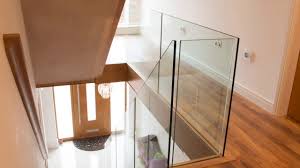 Wood monostringer staircase with structural glass. Frameless Glass Staircase Installation Youtube