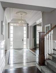 With a variety of options in coloring and finish, marble tiles can complement virtually any color scheme. Simple And Quiet Calm Relax Foyer Foyer Design Foyer Flooring Marble House