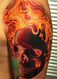 Adding flames to your skull tattoo design make it look even more impressive. Flaming Skull Tattoos Inked Magazine Flame Tattoos Skull Tattoo Design Skull Sleeve Tattoos