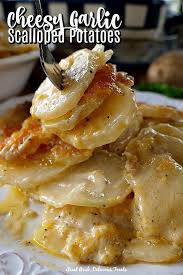Cheesy Garlic Scalloped Potatoes Are A Delicious Side Dish Recipe Loaded With 3 Types Of Cheese Sour Cream Scalloped Potato Recipes Potato Side Dishes Recipes