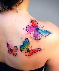 Butterfly Tattoos For Women On The Shoulder Tattoo Idea Butterfly Tattoo On Shoulder Colorful Butterfly Tattoo Butterfly Tattoos For Women