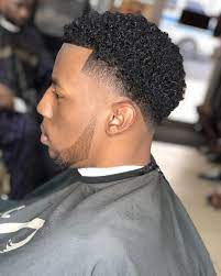 Many of the most popular hairstyles for a black man incorporate a fade haircut that's low, medium, or high, with styling on top. Chipz Haircut