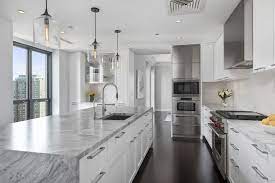 Contact jack rosen custom kitchens, inc. An All White Modern Contemporary Kitchen In Chicago S Waldorf Astoria Modern Kitchen Design Modern Kitchen Island Design Kitchen Design Modern Contemporary