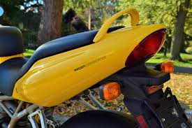 Image result for Nuget Yellow 1999 Motorcycle