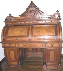 With the 100's to maybe 1000 and more furniture makers up to 1970 or so, a person who has the one that possibly had a label to it woud be the only person who could give any answer to a maker. Desks
