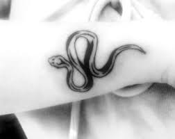 Check spelling or type a new query. Snake Tattoo Meaning Youqueen