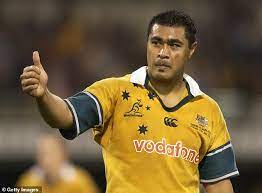Wallabies legend toutai kefu is clinging to life after being stabbed in his brisbane home while trying to defend his family. X8hspky Glbchm