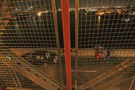 Biker dies in plunge off bridge