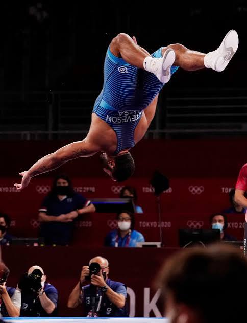 9 awesome photos of American wrestler Gable Steveson celebrating gold with his signature backflip