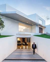 This Modern Pad Has A Drool Worthy Underground Garage Underground Homes Luxury Garage Garage Design