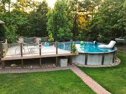 It gives you design ideas for the outside of the pool as well. Pool Deck Ideas Partial Deck The Pool Factory In 2021 Pool Decks Decks Around Pools Above Ground Pool Landscaping