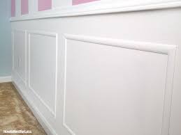 We did the basic chair rail molding at 36″ from the floor and decided on a 5″ spacer board for the big wall, so those are the measurements we went by. Picture Frame Moldings On A Budget How To Nest For Less
