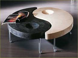 After bathing in a black textured powder coat which brings the ultimate finesse to the frame, each table is checked carefully based on strict quality standards. Hugedomains Com Unique Coffee Table Unique Coffee Table Design Coffee Table Design