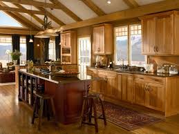 The Warm Tones Of Hickory Cabinets In Honey Spice Are Enhanced With An Island In Cabernet The Appl Hickory Kitchen Cabinets Hickory Kitchen Kraftmaid Kitchens
