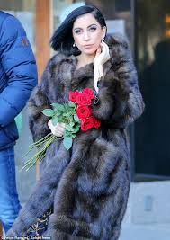 She entered the stage smoking a cigarette, wearing a black coat, and a white shirt. Lady Gaga And Taylor Kinney Engaged Lady Gaga Lady Gaga Daily Lady Gaga Photos