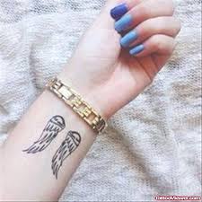 These tattoos can be used to portray various symbolic meaning and depending on the person with the tattoo the symbolic meanings are unlimited. Left Wrist Angel Wings Tattoo
