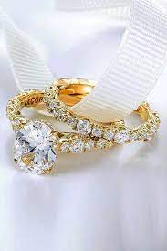 Unlike their white gold and platinum counterparts, the yellow hue gives the gold band a soft appearance and a distinctive allure of warmth. 27 The Best Yellow Gold Engagement Rings From Pinterest Oh So Perfect Proposal