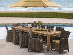 Teak Garden Classics Mandalay Resin Wicker And Solid Teak Dining Set Is The Best If Both Worlds With Style To Spare