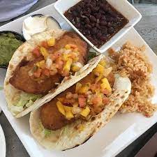 Season with ½ teaspoon salt and ¼ teaspoon pepper and let sit at room temperature while the fish marinates. Fish Tacos Picture Of Jimmy Buffett S Margaritaville Niagara Falls Tripadvisor