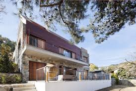 Modern Home In Cyprus By Vardastudio Stone And Irokko Wood Shaping A Home In Picturesque Cyprus Vill Architecture Stone Houses Contemporary Architecture Design