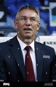 Southampton manager Nigel Adkins in the dugout during the Barclays Premier  League match at Loftus Road, London Stock Photo