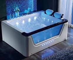 Young beautiful woman relaxing in a hot tub. China Whirlpool Massage Bathtub For 2 Person Freestanding Bath Tub China Whirlpool Massage Bathtub Massage Bathtub