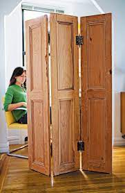 A divider rail is a stationary strip that allows you to open the top louvers while leaving the bottom closed. Link Together Old Shutters For A Practical Folding Screen Bamboo Room Divider Diy Room Divider Room Divider Bookcase