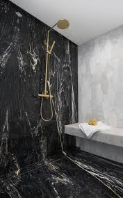 Black And Gold Tiles Uk Zebrino Black Marble Shower With Gold Plumbing Black Marble Bathroom White Marble Bathrooms Bathroom Design Black