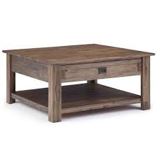 Apply several coats of stain or paint to the wooden components, if you want to protect them from decay and to enhance the look of the table. 38 Garret Square Coffee Table Rustic Natural Aged Brown Wyndenhall Target
