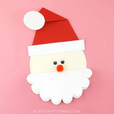 Make a christmas card using a free printable; Santa Card I Heart Crafty Things