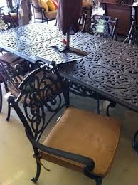 Chateau Cast Aluminum Extension Dining Table With Self Storing Leaves From Treesntrends Com And Stores Patio Cushions Extension Dining Table Aluminum Extension