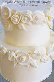 Elegant White Buttercream Flowers A Cake Video Tutorial Floral Cake Floral Cake Design Buttercream Designs