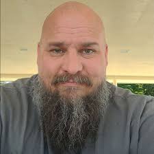 Who is the deceased person in the police escort