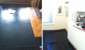 the kitchen has a new floor! daniel