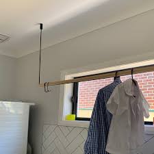 We did not find results for: Modern Hanging Clothes Rack In Black Ceiling Mounted Hanging Etsy Hanging Clothes Hanging Clothes Racks Laundry Room Layouts