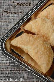Sweet Somas Recipe How To Make Sweet Somas Kajjikayalu Recipe Spiceindiaonline Recipes Easy Biryani Recipe Sweet Recipes