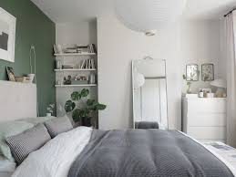Papers, books, and accessories run rampant over a desktop, leaving little room to actually work. A Simple Soothing Botanical Green Bedroom Makeover The Reveal