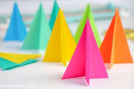 Have them trace their hand on a sheet of paper to create santa's beard and rudolph's antlers! Paper Christmas Tree Craft Made With Happy