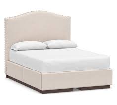 Dark brown fabric accents the center of the bed's headboard, the top of the side rails. Raleigh Curved Upholstered Tall Side Storage Platform Bed Tufted Upholstered Bed Upholstered Beds Upholstered Headboard