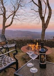 The restaurant at Gideon Ridge Inn offers a refined yet cozy dining experience, set against a wall of glass that opens to sweeping mountain views. With warm lighting, white tablecloths, and a serene ambiance, this intimate space invites guests to linger over thoughtfully crafted meals in a setting that feels both upscale and personal.
