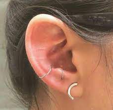 This Conch Looks Delicate And Less Painful Bodyjewelry Earings Piercings Tragus Piercings Ear Piercings