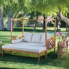 Visually this turns the bed sideways and into a daybed. Belham Living Brighton Outdoor Daybed And Ottoman Natural Www Hayneedle Com Outdoor Daybed Outdoor Beds Yard Furniture